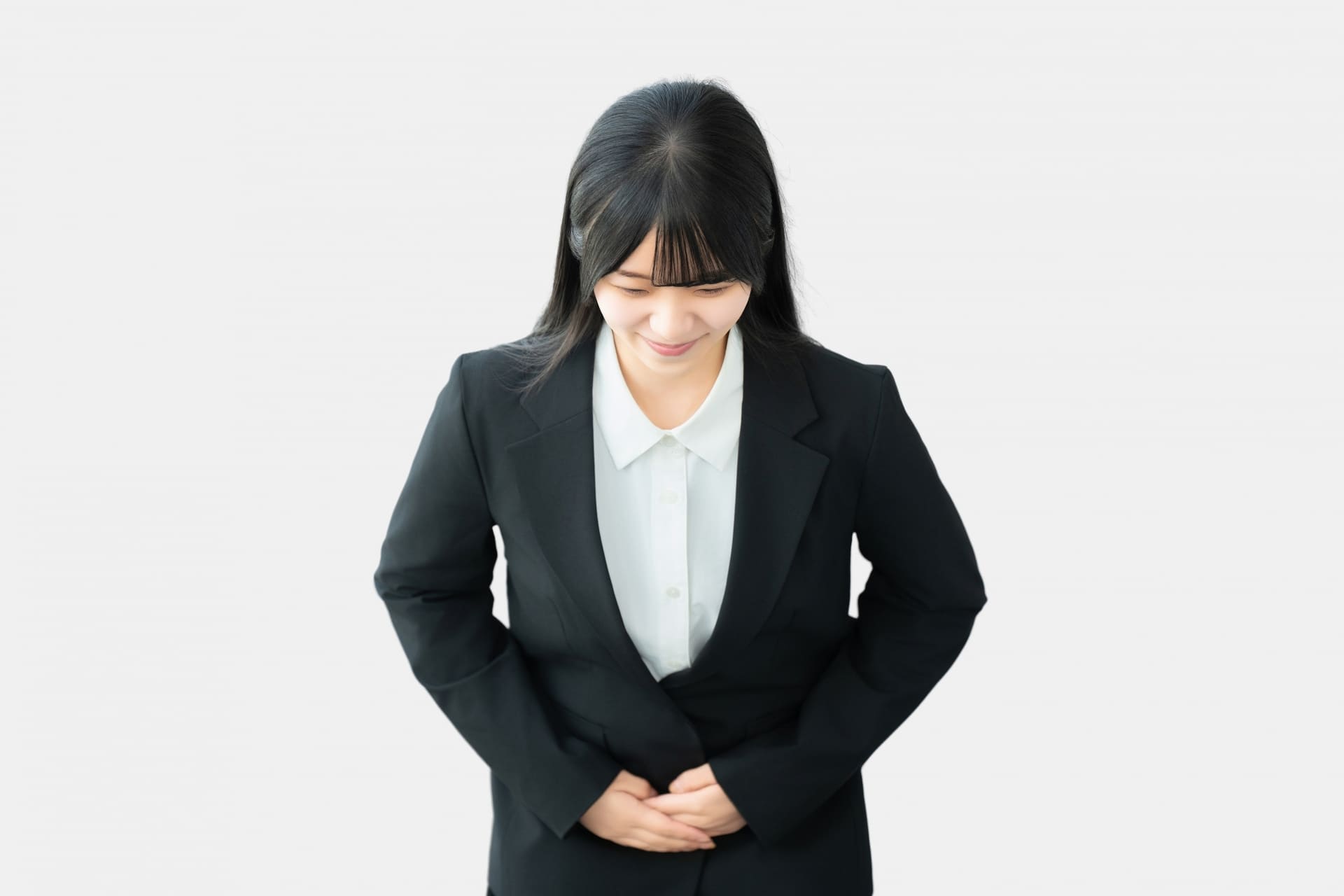 お辞儀する女性